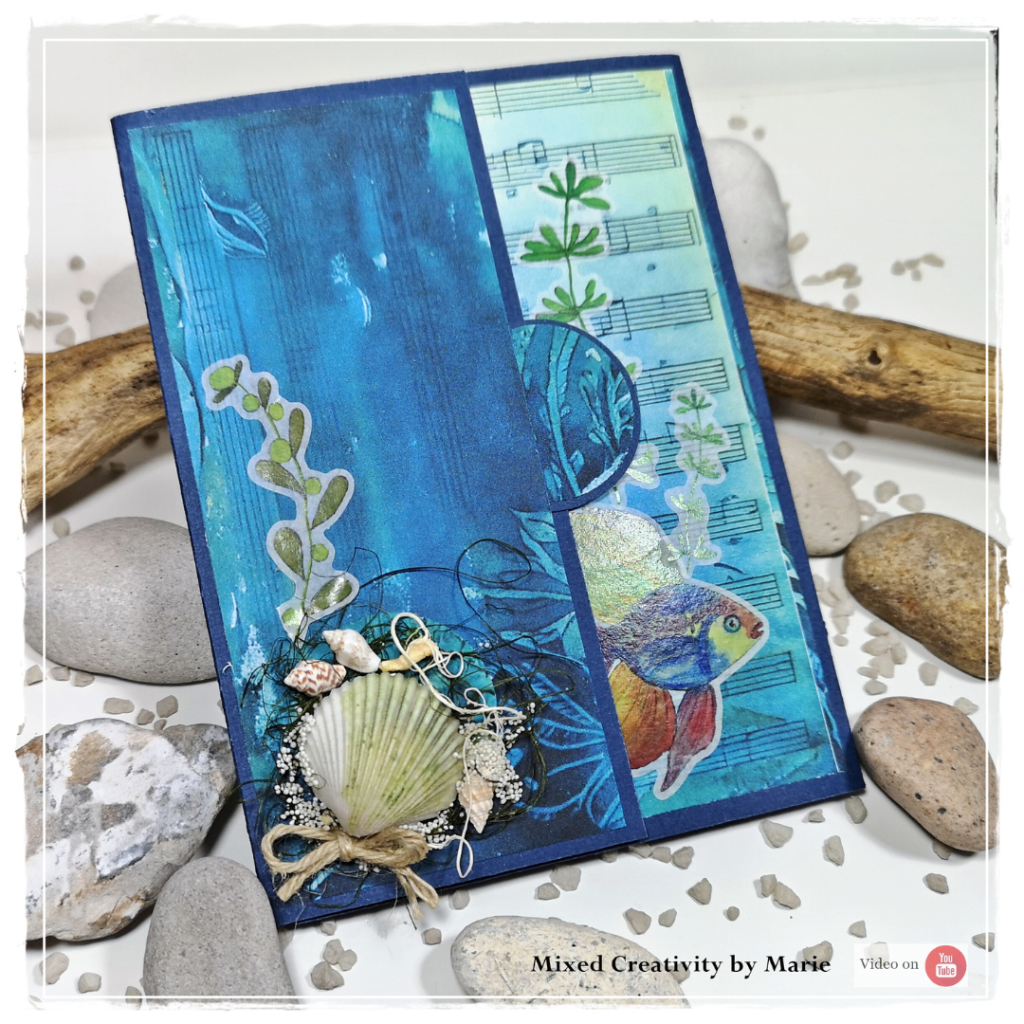 ront cover of handmade mini album decorated with Mermaid Fairies and Ocean Treasures by Bea Grob, featuring shell and seaweed details