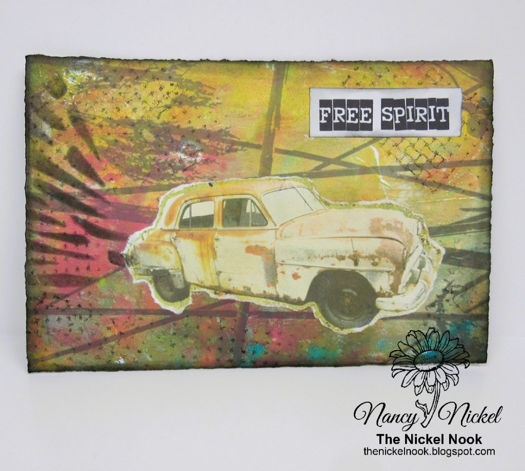 An artistic background featuring vibrant colors and textures, with a collage of a vintage white car and the phrase 'FREE SPIRIT' displayed prominently.