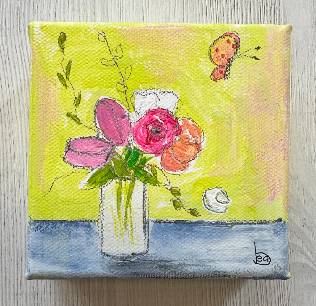 A painted canvas featuring a floral arrangement with pink, red, and orange flowers in a white vase against a vibrant yellow background, accompanied by a small butterfly.